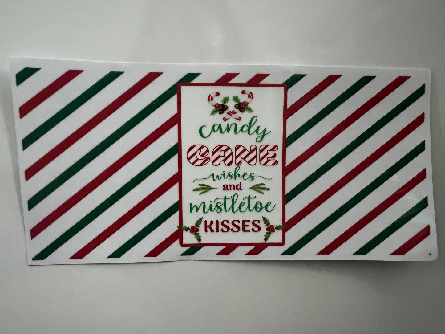 Candy cane kisses and mistletoe wished Christmas wrap